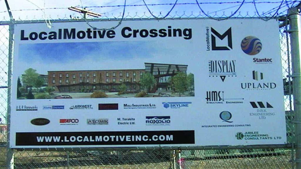 Construction site sign for Motive Crossing