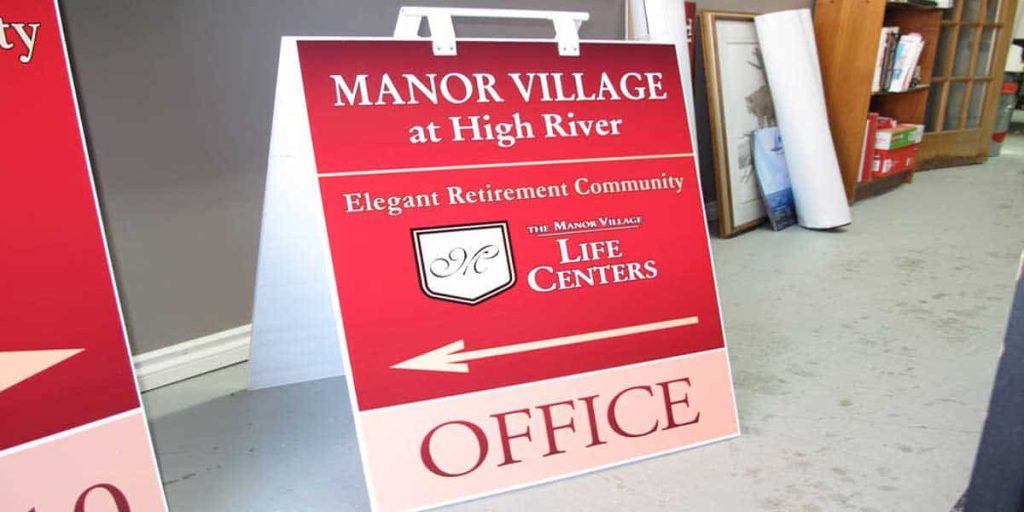 A-board sign for Manor Village at High River, made by Summit Signs and Design