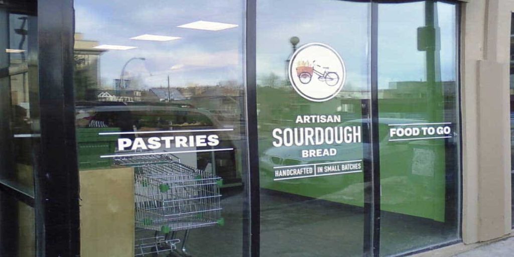 Frosted window vinyl graphics reading Partners