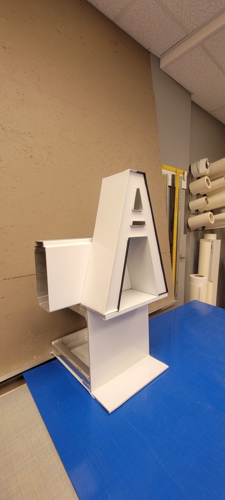 Aluminum channel letter A being fabricated on the bench in the Summit Signs shop