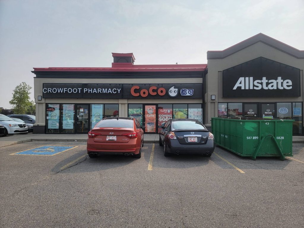 Crowfoot Pharmacy and CoCo storefront signs installed on a Calgary plaza