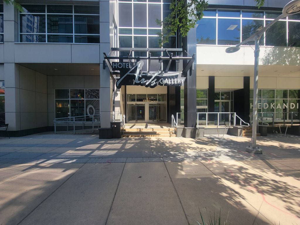 Canopy sign installed over the Hotel Arts Gallery entrance in Calgary